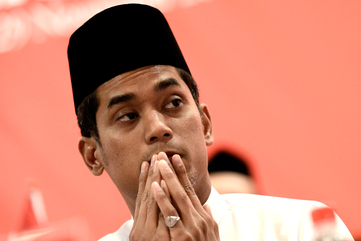 Umno youth chief Khairy Jamaluddin looks on during the party’s general assembly, today. – The Malaysian Insider pic by Najjua Zulkefli, November 26, 2014.
