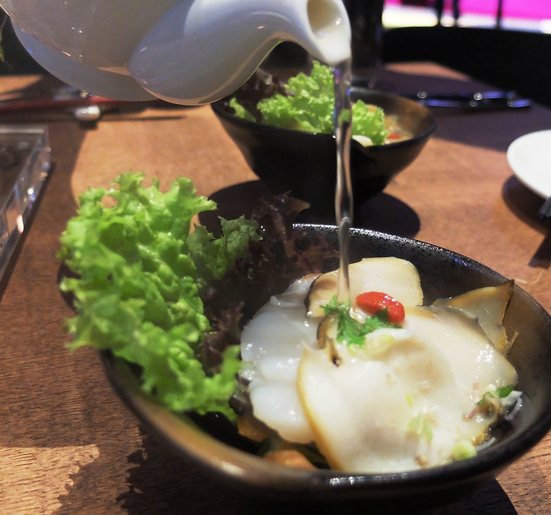 Unicorn's Bait is a dish of fresh abalone served with clear spicy soup.