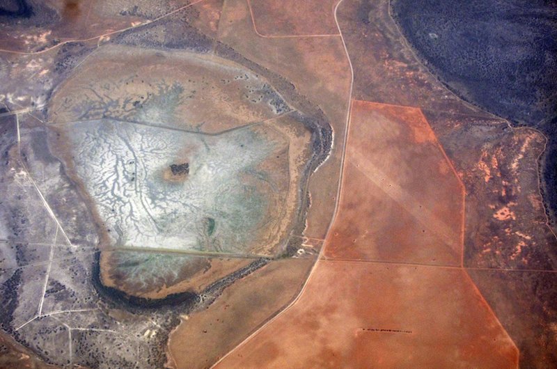 A salt-affected water catchment area can be seen amid drought affected farmland in south Australia, November 26, 2015. Experts warn that climate change will affect human health in numerous ways. – Reuters pic, November 28, 2015.