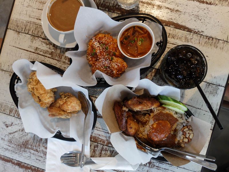 Clockwise from top: sweet and sticky Korean fried chicken, nasi lemak with rempah fried chicken and the signature crunch with buttermilk coating with a side of Kopi B at Sentul's Project B. – The Malaysian Insider pic by Yap Pik Kuan, January 26, 2016.