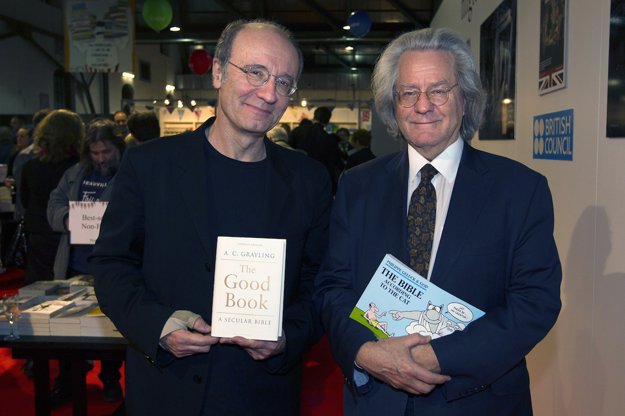 British philosopher Anthony Clifford Grayling (right) with cartoonist Philippe Geluck at the Brussels Book Fair in 2014. – AFP pic, October 31, 2015.