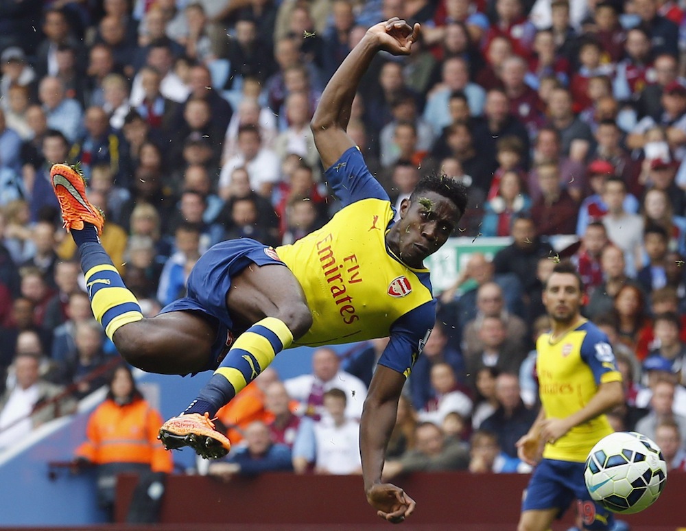 Danny Welbeck in full acrobatic style taking a shot at goal in Arsenal's 3-0 win at Aston Villa last month. - Reuters pic, October 5, 2014.