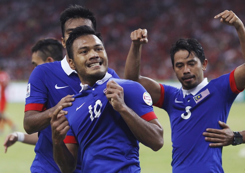 Malaysia's Mohd Safee Bin Mohd Sali (10) celebrates his goal against Singapore during their AFF Suzuki Cup Group B match at the National Stadium in Singapore. – Reuters pic, November 29, 2014.