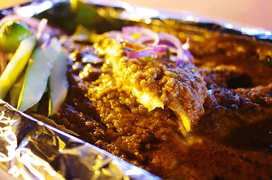 Fresh onions and cucumbers plus a squeeze of lime cuts through the spiciness of the baked fish. – Pic courtesy of Hungry Go Where, October 29, 2014.