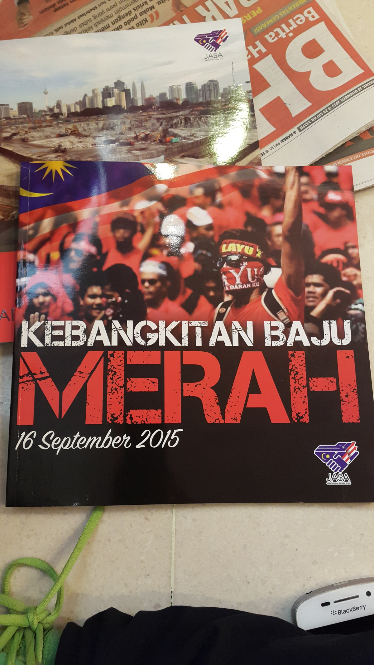 A copy of the booklet defending the red shirt rally last September distributed to Umno delegates today. – The Malaysian Insider pic, December 10, 2015.